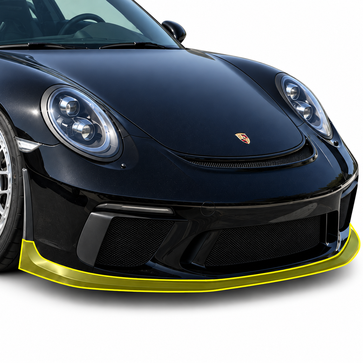 Close-up of a black Porsche 991.2 GT3 front end on a white background with only the Cup front lip spoiler highlighted yellow; illustrative overlay, side extensions sold separately.